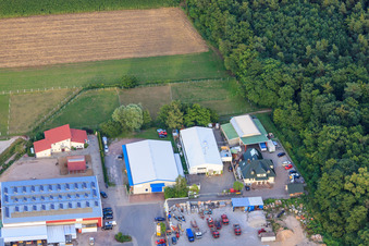 Aerial photograpy of Am Gäxwald industrial estate with REGAB GmbH civil engineering, transparent packaging Weber GmbH and Feinwerk precision and measuring technology GmbH & Co. KG in Herxheim bei Landau in the state Rhineland-Palatinate, Germany