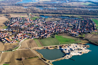 Aerial photograpy of Village - view on the edge of agricultural fields and farmland in Leimersheim in the state Rhineland-Palatinate