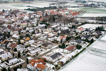 Aerial view of Place in winter with snow in Freckenfeld in the state Rhineland-Palatinate, Germany