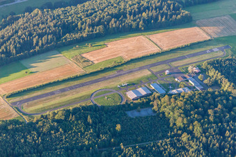 Runway with tarmac terrain of airfield Aero-Club Odenwald e.V. in Michelstadt in the state Hesse, Germany