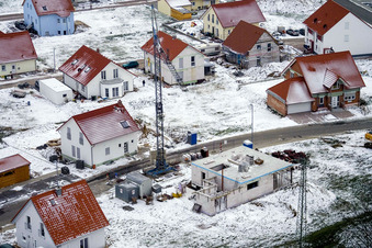 New development area NE in winter with snow in the district Schaidt in Wörth am Rhein in the state Rhineland-Palatinate, Germany from the plane