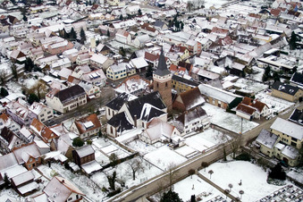 Aerial view of Church in winter with snow in the district Schaidt in Wörth am Rhein in the state Rhineland-Palatinate, Germany