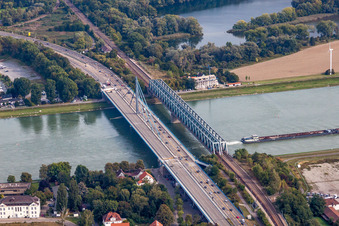 Rail and Street bridges construction across the Rhine river between Karlsruhe and Woerth am Rhein in the state Rhineland-Palatinate, Germany seen from above