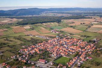 Oblique view of Village - view on the edge of agricultural fields and farmland in Uhrwiller in Grand Est, France