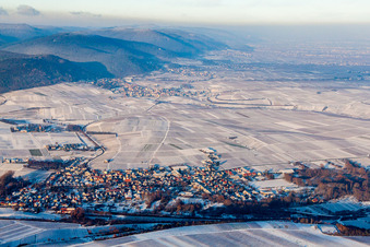 Aerial view of Wintry snowy Town View of the streets and houses of the residential areas in Siebeldingen in the state Rhineland-Palatinate, Germany