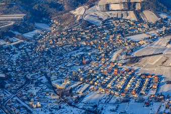 Village view in winter with snow from the south in Albersweiler in the state Rhineland-Palatinate, Germany