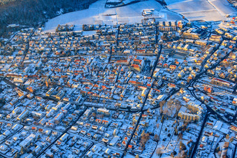 B427 Weinstraße in winter with snow in Bad Bergzabern in the state Rhineland-Palatinate, Germany