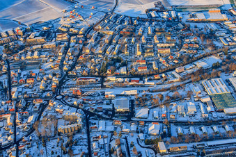 B427 and Landauer Straße in winter with snow in Bad Bergzabern in the state Rhineland-Palatinate, Germany
