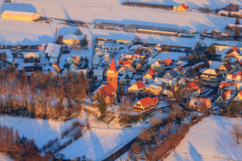 Protest. Church in winter with snow in Minfeld in the state Rhineland-Palatinate, Germany out of the air