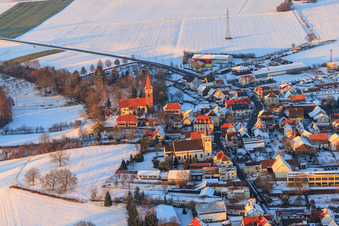 Aerial photograpy of Herrengasse in winter with snow in Minfeld in the state Rhineland-Palatinate, Germany