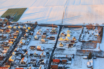Aerial view of New development area in Holderbusch in winter with snow in Minfeld in the state Rhineland-Palatinate, Germany