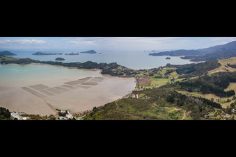 Aerial view of Coastline on the sandy beach of Sued-Pazifik in the district Mcgreogor Bay in Coromandel in Waikato, New Zealand