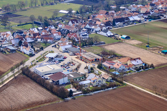Aerial view of Karlshöhlchen commercial area with Heinz Memmer car dealership in Freckenfeld in the state Rhineland-Palatinate, Germany
