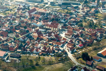 Church building of St. John the Baptist in the village center in Stadtlauringen in the state Bavaria, Germany