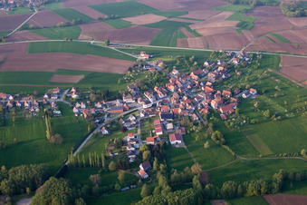 Village - view on the edge of agricultural fields and farmland in Keffenach in Grand Est, France