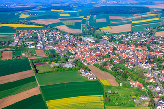 Village between fields from the east in Schwanfeld in the state Bavaria, Germany
