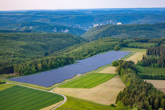 Large open-space PV system at the edge of the forest in the district Kreenheinstetten in Leibertingen in the state Baden-Wuerttemberg, Germany