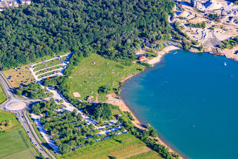 Aerial view of Sunbathing lawn at Epplesee covered with bathers in the district Silberstreifen in Rheinstetten in the state Baden-Wuerttemberg, Germany