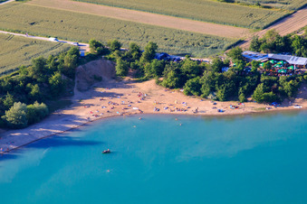 Nudist beach Epplesee crowded with bathers in the district Forchheim in Rheinstetten in the state Baden-Wuerttemberg, Germany seen from above