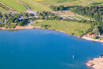 Aerial view of Sunbathing lawn at Epplesee full of bathers in the district Silberstreifen in Rheinstetten in the state Baden-Wuerttemberg, Germany