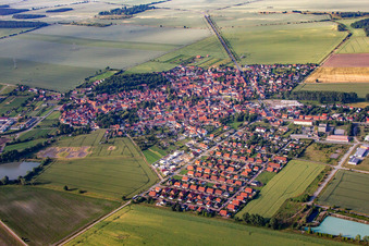 Village - view on the edge of agricultural fields and farmland in Harsleben in the state Saxony-Anhalt, Germany