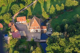Oblique view of Bienwaldmühle grain mill on the Lauter in Scheibenhardt in the state Rhineland-Palatinate, Germany