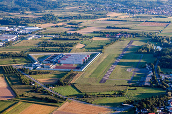 Prison grounds and high security fence Prison Justizvollzugsanstalt Offenburg on Flugplatz Offenburg-Baden in Offenburg in the state Baden-Wurttemberg, Germany