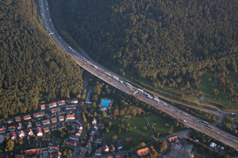 Aerial view of Wölfle outdoor pool under the A6 motorway in the district Wolfartsweier in Karlsruhe in the state Baden-Wuerttemberg, Germany