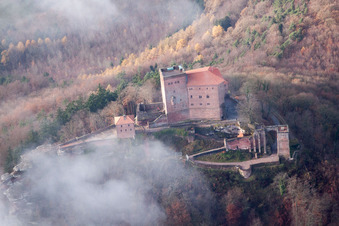 Oblique view of Trifels Castle in clouds in Annweiler am Trifels in the state Rhineland-Palatinate, Germany