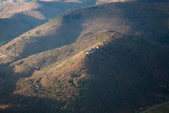 Madenburg castle ruins in winter with snow in Eschbach in the state Rhineland-Palatinate, Germany from the drone perspective