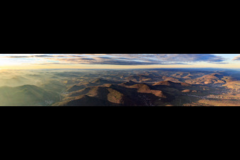 Panoramic perspective of the evening forest and mountain landscape of the Palatinate Forest from Waldrohrbach to the edge of the Haardt near Albersweiler in winter in Leinsweiler in the state Rhineland-Palatinate, Germany