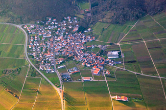 Wine-growing village in winter between bare vineyards from the east in Eschbach in the state Rhineland-Palatinate, Germany