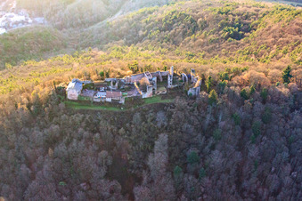 Aerial photograpy of Madenburg, Remains of an 11th-century hilltop castle surrounded by forests with a restaurant from the west in Eschbach in the state Rhineland-Palatinate, Germany