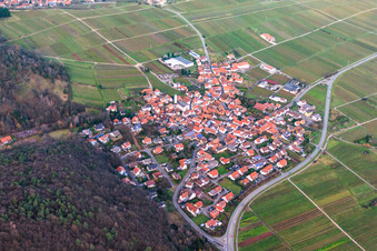 Wine-growing village in winter between bare vineyards from the southwest in Eschbach in the state Rhineland-Palatinate, Germany