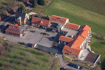 Complex of the hotel building Wohlfuehlhotel Alte Rebschule and Gasthaus Sesel in Rhodt unter Rietburg in the state Rhineland-Palatinate, Germany from above