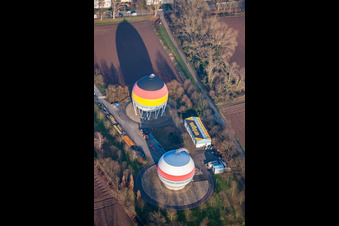 French German painted gas storage tanks in Rastatt in the state Baden-Wuerttemberg, Germany from above