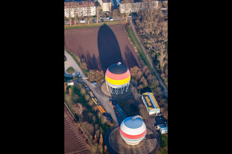 French German painted gas storage tanks in Rastatt in the state Baden-Wuerttemberg, Germany out of the air