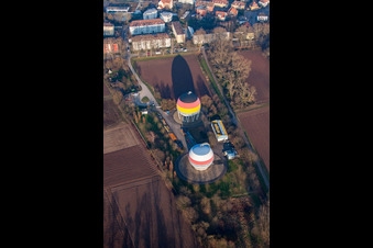 French German painted gas storage tanks in Rastatt in the state Baden-Wuerttemberg, Germany seen from above