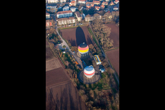 French German painted gas storage tanks in Rastatt in the state Baden-Wuerttemberg, Germany from the plane