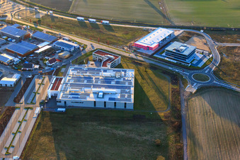 DBK EMS GmbH & Co. KG in the Nordring industrial park in Rülzheim in the state Rhineland-Palatinate, Germany viewn from the air
