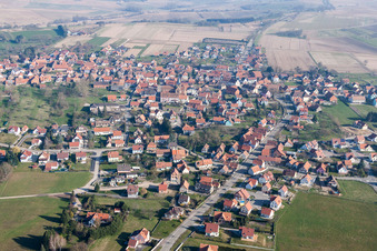 Oblique view of Village - view on the edge of agricultural fields and farmland in Surbourg in Grand Est, France