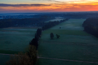 Oblique view of Otterbach lowlands in the morning mist in Kandel in the state Rhineland-Palatinate, Germany