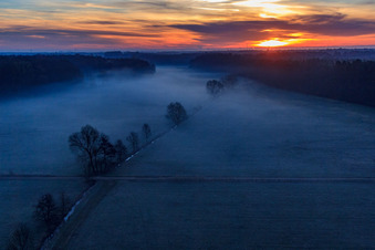 Aerial photograpy of Otterbach lowlands in the morning mist at sunrise in Minfeld in the state Rhineland-Palatinate, Germany