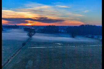 Otterbach lowlands in the morning mist at sunrise in Minfeld in the state Rhineland-Palatinate, Germany from the plane