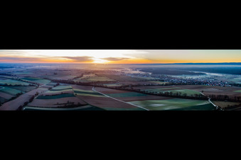Railway line to Weissenburg at sunrise in Freckenfeld in the state Rhineland-Palatinate, Germany