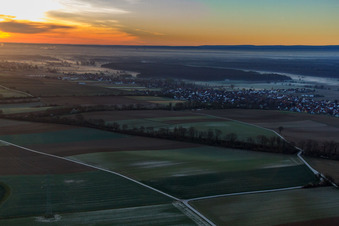 Aerial view of Village view in the morning mist from the northwest in Freckenfeld in the state Rhineland-Palatinate, Germany