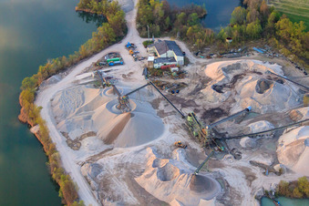 Gravel mining by Heidelberg Materials Mineralik on the Altrhein at Neupotz in Neupotz in the state Rhineland-Palatinate, Germany