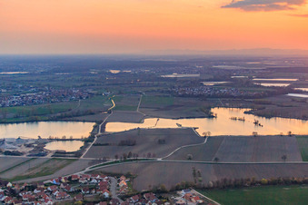 Aerial view of Sunset at the quarry lake in Leimersheim in the state Rhineland-Palatinate, Germany