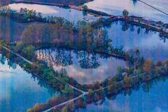 Former dredging pond at the Wolf gravel works in Leimersheim in the state Rhineland-Palatinate, Germany