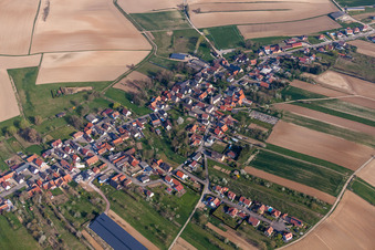 Aerial photograpy of Village - view on the edge of agricultural fields and farmland in Siegen in Grand Est, France